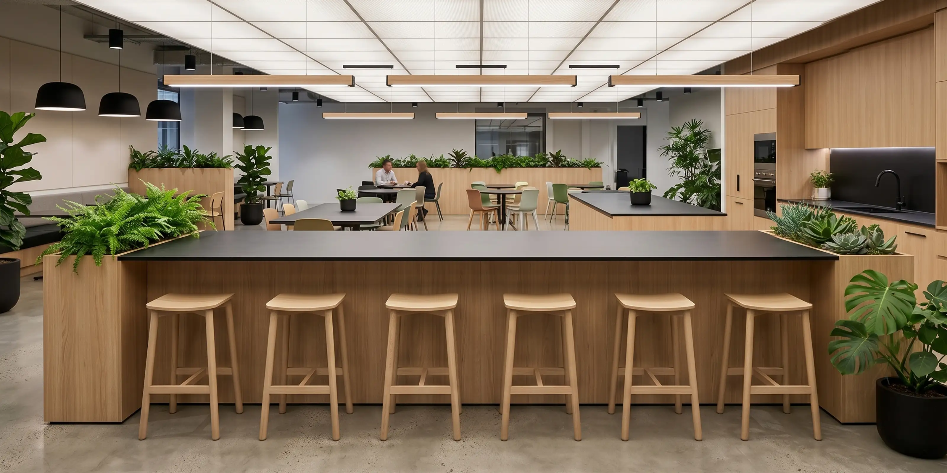 Andi Natural Backless Bar Stools in a Workplace