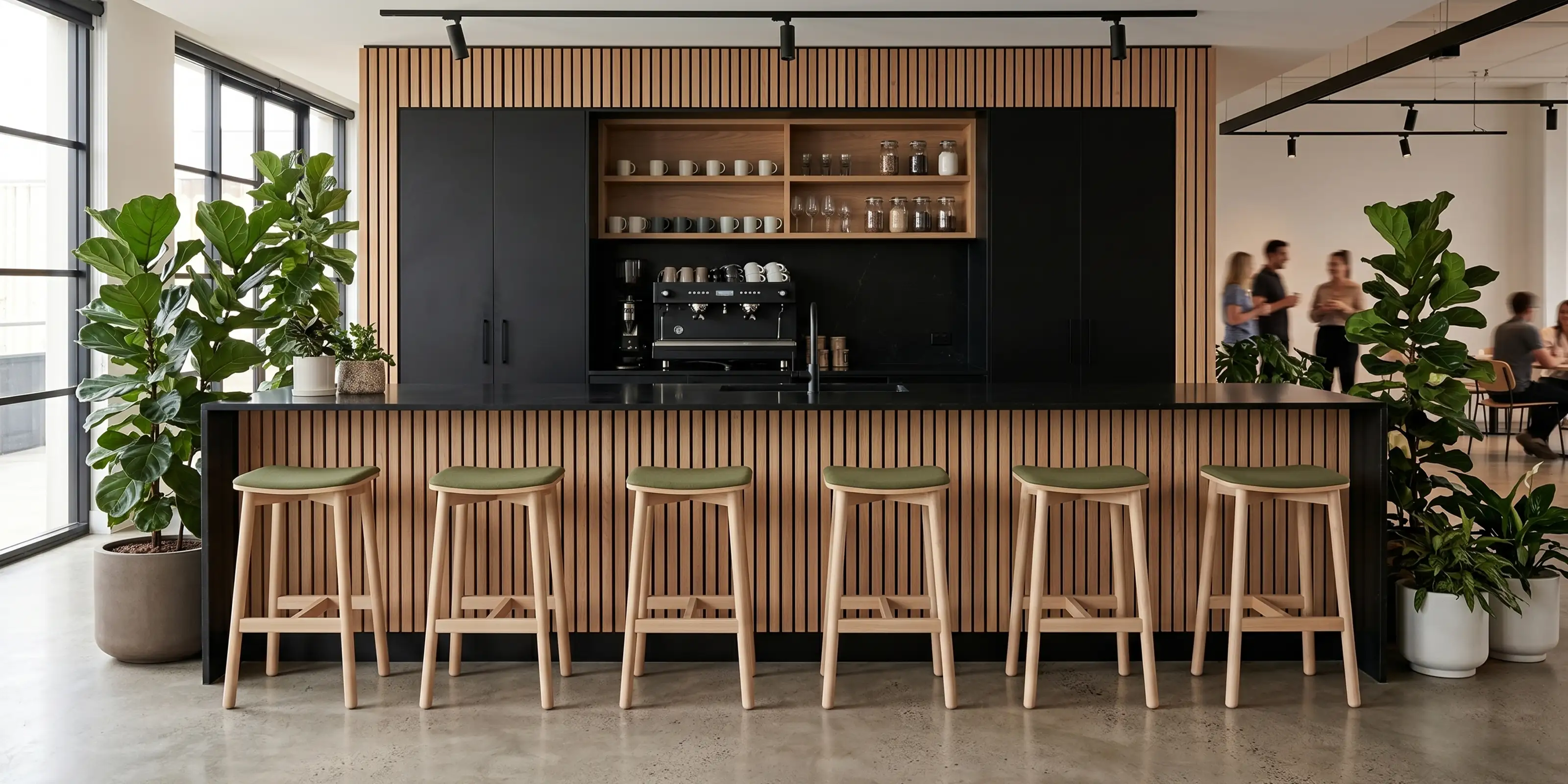 Green upholstered bar stools in office workplace