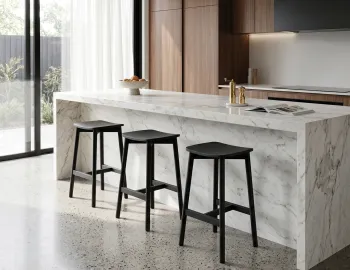 White Marble Kitchen With Black Stools