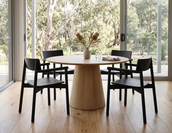 Black Armchairs At Round Dining Table