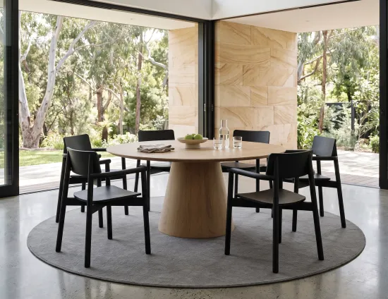 Round Table With Black Dining Armchairs