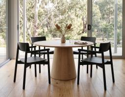 Black Armchairs At Round Dining Table